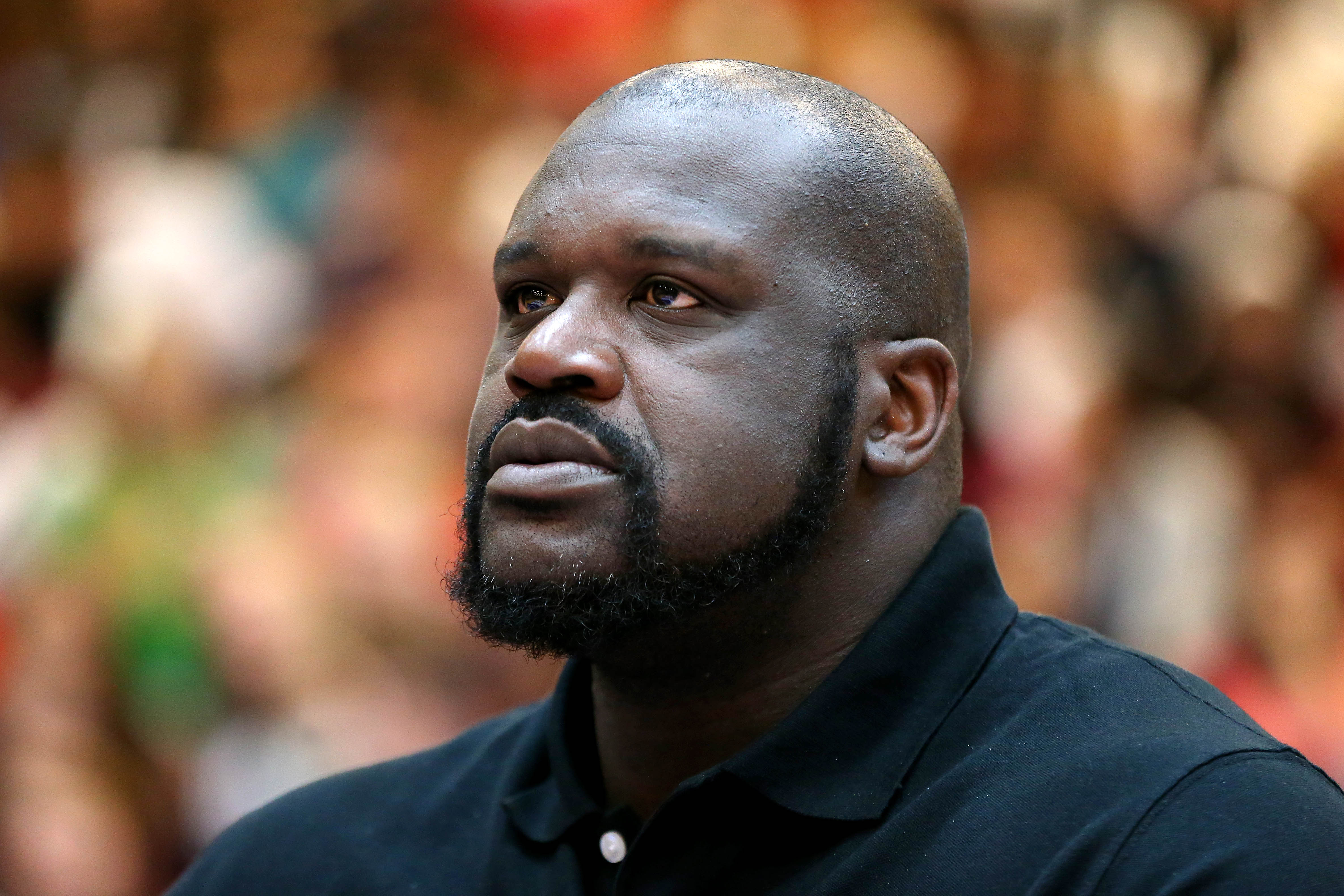 Shaquille O'Neal Has Hilarious Reaction to Getting Water Thrown in His Face  on AEW Dynamite