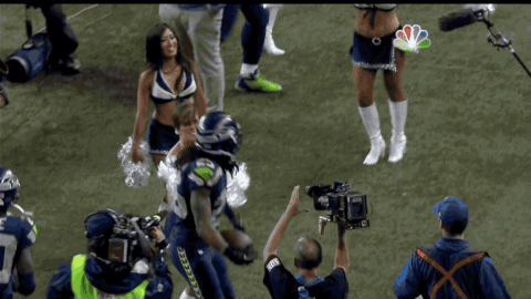 Watch: Seahawks' Sherman Dances with Cheerleaders After INT