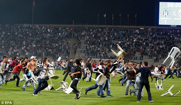 Istanbul Derby Abandoned After Rioting Fans Invade Pitch