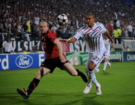 ISTANBUL, TURKEY - SEPTEMBER 15:  Wayne Rooney of Manchester United and Matteo Ferrari of Besitkas challenge for the ball during the UEFA Champions League Group B match between Besiktas and Manchester United at the Inonu Stadium on September 15, 2009 in Istanbul, Turkey.  <br /><br /><span class="help">(Photo by Shaun Botterill/Getty Images)</span>