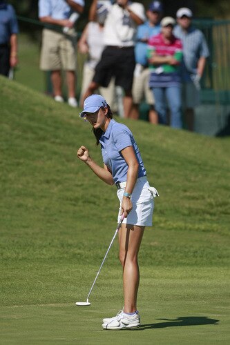 PRATTVILLE, AL - OCTOBER 1:  Michelle Wie reacts after making a birdie on the 18th hole during first round play in the Navistar LPGA Classic at the Robert Trent Jones Golf Trail at Capitol Hill on October 1, 2009 in  Prattville, Alabama.  <br /><br /><span class="help">(Photo by Dave Martin/Getty Images)</span>