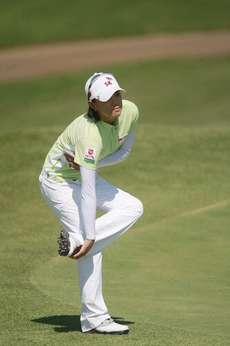 PRATTVILLE, AL - OCTOBER 1:  Na Yeon Choi of South Korea stretches on the ninth green after completing her first round play in the Navistar LPGA Classic at the Robert Trent Jones Golf Trail at Capitol Hill on October 1, 2009 in  Prattville, Alabama.  <br /><br /><span class="help">(Photo by Dave Martin/Getty Images)</span>