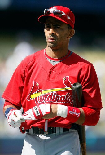 LOS ANGELES, CA - OCTOBER 08:  Julio Lugo #12 of the St. Louis Cardinals looks on during batting practice before taking on the Los Angeles Dodgers in Game Two of the NLDS during the 2009 MLB Playoffs at Dodger Stadium on October 8, 2009 in Los Angeles, California.  <br /><br /><span class="help">(Photo by Jeff Gross/Getty Images)</span>