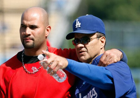LOS ANGELES, CA - OCTOBER 08:  (R-L) Manager Joe Torre of the Los Angeles Dodgers talks with Albert Pujols #5 of the St. Louis Cardinals before Game Two of the NLDS during the 2009 MLB Playoffs at Dodger Stadium on October 8, 2009 in Los Angeles, California.  <br /><br /><span class="help">(Photo by Jeff Gross/Getty Images)</span>
