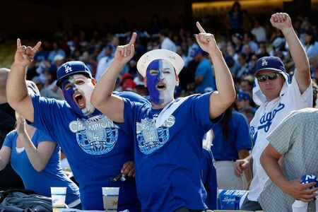 LOS ANGELES, CA - OCTOBER 08:  Fans of the Los Angeles Dodgers cheer on their team against the St. Louis Cardinals in Game Two of the NLDS during the 2009 MLB Playoffs at Dodger Stadium on October 8, 2009 in Los Angeles, California.  <br /><br /><span class="help">(Photo by Jeff Gross/Getty Images)</span>
