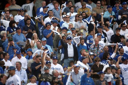 LOS ANGELES, CA - OCTOBER 08:  Fans of the Los Angeles Dodgers cheer on their team against the St. Louis Cardinals in Game Two of the NLDS during the 2009 MLB Playoffs at Dodger Stadium on October 8, 2009 in Los Angeles, California.  <br /><br /><span class="help">(Photo by Stephen Dunn/Getty Images)</span>