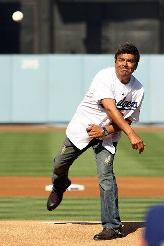 LOS ANGELES, CA - OCTOBER 08:  Comedian George Lopez throws out the first pitch before Game Two of the NLDS between the Los Angeles Dodgers and the St. Louis Cardinals during the 2009 MLB Playoffs at Dodger Stadium on October 8, 2009 in Los Angeles, California.  <br /><br /><span class="help">(Photo by Stephen Dunn/Getty Images)</span>