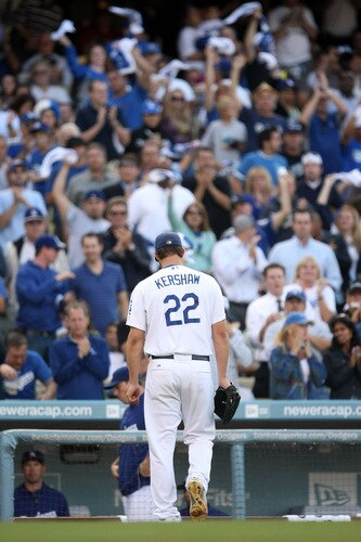 LOS ANGELES, CA - OCTOBER 08:  Pitcher Clayton Kershaw #22 of the Los Angeles Dodgers is taken out of the game in the seventh inning against the St. Louis Cardinals in Game Two of the NLDS during the 2009 MLB Playoffs at Dodger Stadium on October 8, 2009 in Los Angeles, California.  <br /><br /><span class="help">(Photo by Stephen Dunn/Getty Images)</span>