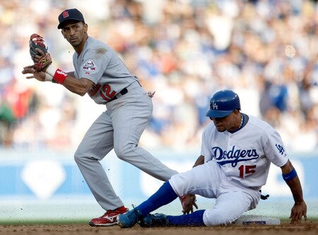 LOS ANGELES, CA - OCTOBER 08:  Rafael Furcal #15 of the Los Angeles Dodgers is out at second base on a fielder's choice as Julio Lugo #12 of the St. Louis Cardinals applies the tag in the sixth inning of Game Two of the NLDS during the 2009 MLB Playoffs at Dodger Stadium on October 8, 2009 in Los Angeles, California.  <br /><br /><span class="help">(Photo by Jeff Gross/Getty Images)</span>