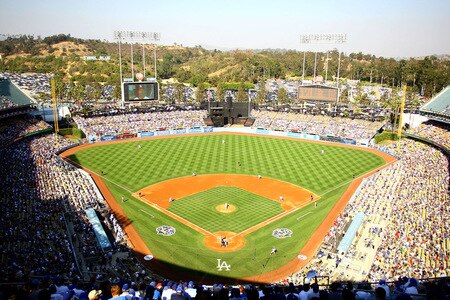 LOS ANGELES, CA - OCTOBER 08:  Pitcher Clayton Kershaw #22 of the Los Angeles Dodgers throws the game's first pitch to Julio Lugo #12 of the St. Louis Cardinals in the first inning of Game Two of the NLDS during the 2009 MLB Playoffs at Dodger Stadium on October 8, 2009 in Los Angeles, California.  <br /><br /><span class="help">(Photo by Maxx Wolfson/Getty Images)</span>