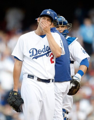 LOS ANGELES, CA - OCTOBER 08:  Pitcher Clayton Kershaw #22 of the Los Angeles Dodgers reacts in the seventh inning against the St. Louis Cardinals in Game Two of the NLDS during the 2009 MLB Playoffs at Dodger Stadium on October 8, 2009 in Los Angeles, California.  <br /><br /><span class="help">(Photo by Jeff Gross/Getty Images)</span>