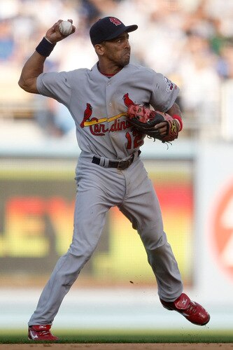LOS ANGELES, CA - OCTOBER 08:  Julio Lugo #12 of the St. Louis Cardinals throws the ball to first base in Game Two of the NLDS during the 2009 MLB Playoffs against the Los Angeles Dodgers at Dodger Stadium on October 8, 2009 in Los Angeles, California.  <br /><br /><span class="help">(Photo by Jeff Gross/Getty Images)</span>