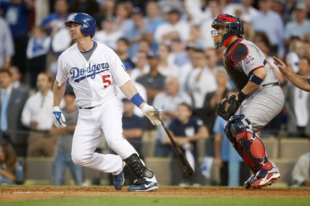 LOS ANGELES, CA - OCTOBER 08:  Mark Loretta #5 of the Los Angeles Dodgers hits a walk-off RBI single to center to score Casey Blake #23 to defeat the St. Louis Cardinals in Game Two of the NLDS during the 2009 MLB Playoffs at Dodger Stadium on October 8, 2009 in Los Angeles, California. The Dodgers defeated the Cardinals 3-2 to take a 2-0 series lead.  <br /><br /><span class="help">(Photo by Jeff Gross/Getty Images)</span>