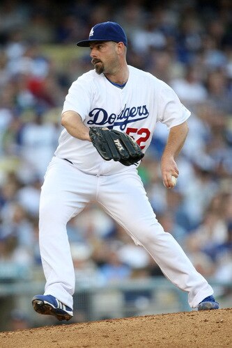 LOS ANGELES, CA - OCTOBER 08:  George Sherrill #52 of the Los Angeles Dodgers on the mound in the ninth inning against the St. Louis Cardinals in Game Two of the NLDS during the 2009 MLB Playoffs at Dodger Stadium on October 8, 2009 in Los Angeles, California. The Dodgers defeated the Cardinals 3-2 to take a 2-0 series lead.  <br /><br /><span class="help">(Photo by Stephen Dunn/Getty Images)</span>