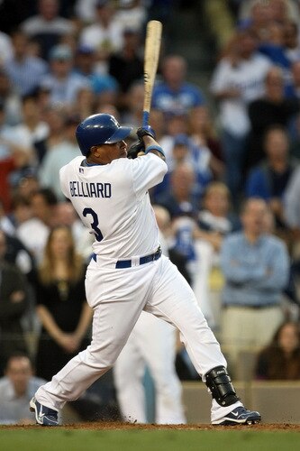 LOS ANGELES, CA - OCTOBER 08:  Ronnie Belliard #3 of the Los Angeles Dodgers singles to center scoring Juan Pierre #9 to tie the game in the ninth inning against the St. Louis Cardinals in Game Two of the NLDS during the 2009 MLB Playoffs at Dodger Stadium on October 8, 2009 in Los Angeles, California. The Dodgers defeated the Cardinals 3-2 to take a 2-0 series lead.  <br /><br /><span class="help">(Photo by Stephen Dunn/Getty Images)</span>