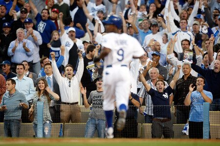 LOS ANGELES, CA - OCTOBER 08:  Juan Pierre #9 of the Los Angeles Dodgers scores the game-tying run in the ninth inning on a single by Ronnie Belliard #3 against the St. Louis Cardinals in Game Two of the NLDS during the 2009 MLB Playoffs at Dodger Stadium on October 8, 2009 in Los Angeles, California. The Dodgers defeated the Cardinals 3-2 to take a 2-0 series lead.  <br /><br /><span class="help">(Photo by Jeff Gross/Getty Images)</span>