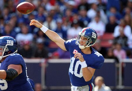 EAST RUTHERFORD, NJ - OCTOBER 11:  Eli Manning #10 of the New York Giants throws a pass against the Oakland Raiders on October 11, 2009 at Giants Stadium in East Rutherford, New Jersey.  <br /><br /><span class="help">(Photo by Jim McIsaac/Getty Images)</span>