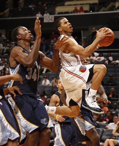 CHARLOTTE, NC - OCTOBER 23  D.J. Augustin #14 of the Charlotte Bobcats shoots against Hasheem Thabeet #34 of the Memphis Grizzlies on October 23, 2009 at Time Warner Cable Arena in Charlotte, North Carolina.  <br /><br /><span class="help">(Photo by Kent Smith/NBAE via Getty Images)</span>