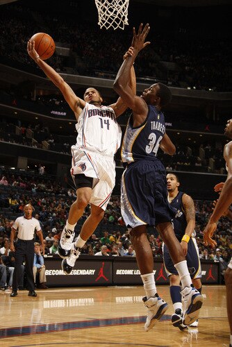 CHARLOTTE, NC - OCTOBER 23  D.J. Augustin #14 of the Charlotte Bobcats shoots against Hasheem Thabeet #34 of the Memphis Grizzlies on October 23, 2009 at Time Warner Cable Arena in Charlotte, North Carolina.  <br /><br /><span class="help">(Photo by Kent Smith/NBAE via Getty Images)</span>
