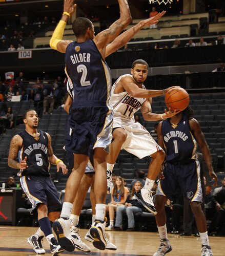 CHARLOTTE, NC - OCTOBER 23  D.J. Augustin #14 of the Charlotte Bobcats shoots against Trey Gilder #2 of the Memphis Grizzlies on October 23, 2009 at Time Warner Cable Arena in Charlotte, North Carolina.  <br /><br /><span class="help">(Photo by Kent Smith/NBAE via Getty Images)</span>