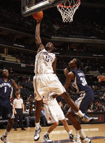 CHARLOTTE, NC - OCTOBER 23  Nazr Mohammed #13 of the Charlotte Bobcats shoots against the Memphis Grizzlies on October 23, 2009 at Time Warner Cable Arena in Charlotte, North Carolina.  <br /><br /><span class="help">(Photo by Kent Smith/NBAE via Getty Images)</span>