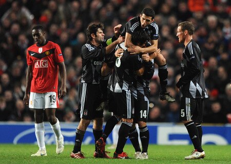 MANCHESTER, UNITED KINGDOM - NOVEMBER 25:  Rodrigo Tello of Besiktas is mobbed by his team mates after scoring the opening goal during the UEFA Champions League Group B match between Manchester United and Besiktas at Old Trafford on November 25, 2009 in Manchester, England. <br /><br /><span class="help">(Photo by Laurence Griffiths/Getty Images)</span>
