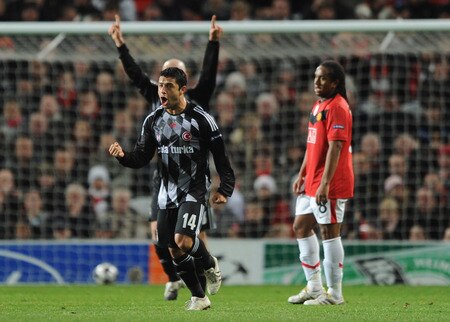 MANCHESTER, ENGLAND - NOVEMBER 25:  Rodrigo Tello of Besiktas celebrates after scoring the opening goal during the UEFA Champions League Group B match between Manchester United and Besiktas at Old Trafford on November 25, 2009 in Manchester, England.  <br /><br /><span class="help">(Photo by Laurence Griffiths/Getty Images)</span>