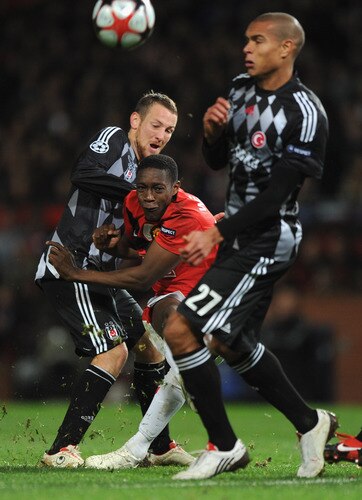 MANCHESTER, ENGLAND - NOVEMBER 25:  Michael Fink of Besiktas challenges Danny Welbeck of Manchester United during the UEFA Champions League Group B match between Manchester United and Besiktas at Old Trafford on November 25, 2009 in Manchester, England.  <br /><br /><span class="help">(Photo by Laurence Griffiths/Getty Images)</span>