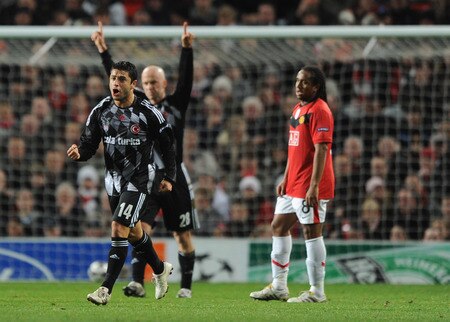 MANCHESTER, ENGLAND - NOVEMBER 25:  Rodrigo Tello of Besiktas celebrates after scoring the opening goal during the UEFA Champions League Group B match between Manchester United and Besiktas at Old Trafford on November 25, 2009 in Manchester, England.  <br /><br /><span class="help">(Photo by Laurence Griffiths/Getty Images)</span>