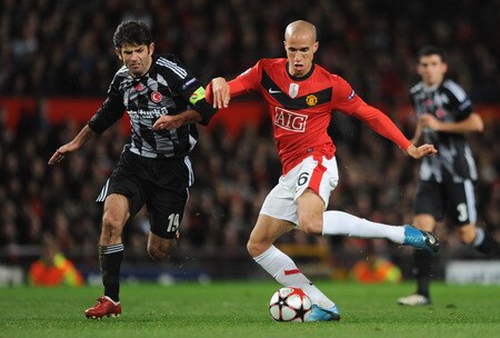 MANCHESTER, UNITED KINGDOM - NOVEMBER 25:  Gabriel Obertan of Manchester United shoots under pressure from Ibrahim Uzulmez of Besiktas during the UEFA Champions League Group B match between Manchester United and Besiktas at Old Trafford on November 25, 2009 in Manchester, England. <br /><br /><span class="help">(Photo by Laurence Griffiths/Getty Images)</span>