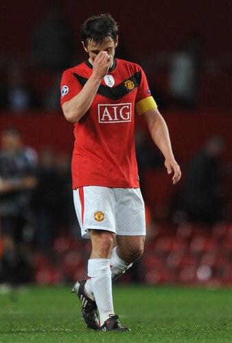 MANCHESTER, ENGLAND - NOVEMBER 25:  Gary Neville of Manchester United shows his dejection at the end of the UEFA Champions League Group B match between Manchester United and Besiktas at Old Trafford on November 25, 2009 in Manchester, England.  <br /><br /><span class="help">(Photo by Laurence Griffiths/Getty Images)</span>
