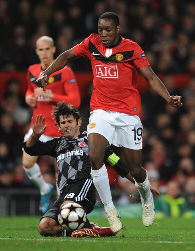 MANCHESTER, ENGLAND - NOVEMBER 25:  Ibrahim Uzulmez of Besiktas tackles Danny Welbeck of Manchester United during the UEFA Champions League Group B match between Manchester United and Besiktas at Old Trafford on November 25, 2009 in Manchester, England.  <br /><br /><span class="help">(Photo by Laurence Griffiths/Getty Images)</span>