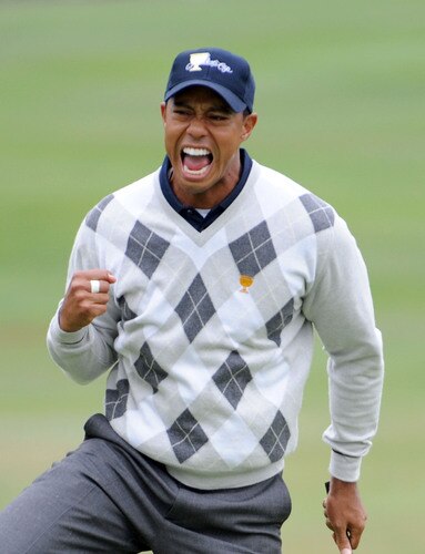 SAN FRANCISCO - OCTOBER 10:  (FILE PHOTO)  Tiger Woods of the USA Team celebrates his putt for a birdie to win the 17th hole during the Day Three Morning Foursome Matches of The Presidents Cup at Harding Park Golf Course on October 10, 2009 in San Francisco, California. According to reports December 11, 2009, Woods announced that he would take an indefinite hiatus from golf.    <br /><br /><span class="help">(Photo by Harry How/Getty Images)</span>