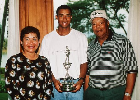 25 Jan 1998:  (FILE PHOTO)  Tiger Woods with his parents Kultida and Earl Woods at the Johnnie Walker Classic at Blue Canyon Golf Club, Thailand. According to reports December 11, 2009, Woods announced that he would take an indefinite hiatus from golf.   <br /><br /><span class="help">(Photo by David Cannon/Getty Images)</span>