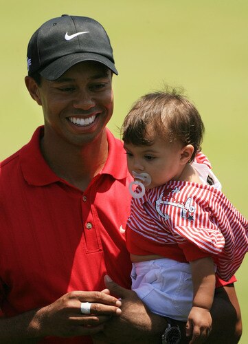 SAN DIEGO - JUNE 16: (FILE PHOTO) Tiger Woods holds his daughter Sam after winning the playoff round of the 108th U.S. Open at the Torrey Pines Golf Course (South Course) on June 16, 2008 in San Diego, California. According to reports December 11, 2009, Woods announced that he would take an indefinite hiatus from golf.    <br /><br /><span class="help">(Photo by Travis Lindquist/Getty Images)</span>