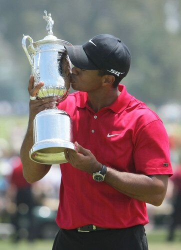 SAN DIEGO - JUNE 16: (FILE PHOTO)   Tiger Woods celebrates with the trophy after winning on the first sudden death playoff hole during the playoff round of the 108th U.S. Open at the Torrey Pines Golf Course (South Course) on June 16, 2008 in San Diego, California.  According to reports December 11, 2009, Woods announced that he would take an indefinite hiatus from golf.   <br /><br /><span class="help">(Photo by Doug Pensinger/Getty Images)</span>