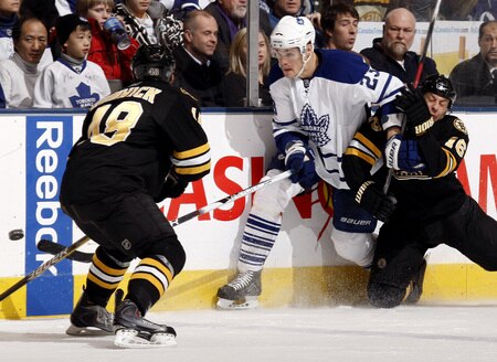 TORONTO - DECEMBER 19:  Alexei Ponikarovsky #23 of the Toronto Maple Leafs tries to get through Matt Hunwick #48 and Marco Sturm #16 of the Boston Bruins during game action December 19, 2009 at the Air Canada Centre in Toronto, Ontario, Canada. <br /><br /><span class="help">(Photo by Abelimages/Getty Images)</span>