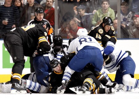 TORONTO - DECEMBER 19: The Toronto Maple Leafs and the Boston Bruins fight after Johnny Boychuk of the Boston Bruins ran into Matt Stajan during game action December 19, 2009 at the Air Canada Centre in Toronto, Ontario, Canada. <br /><br /><span class="help">(Photo by Abelimages/Getty Images)</span>