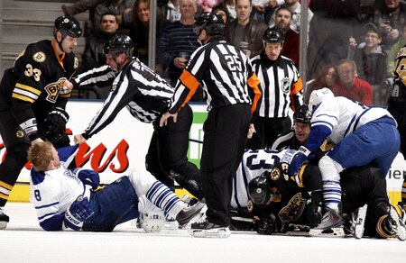 TORONTO - DECEMBER 19: The Toronto Maple Leafs and the Boston Bruins fight after Johnny Boychuk of the Boston Bruins ran into Matt Stajan during game action December 19, 2009 at the Air Canada Centre in Toronto, Ontario, Canada. <br /><br /><span class="help">(Photo by Abelimages/Getty Images)</span>