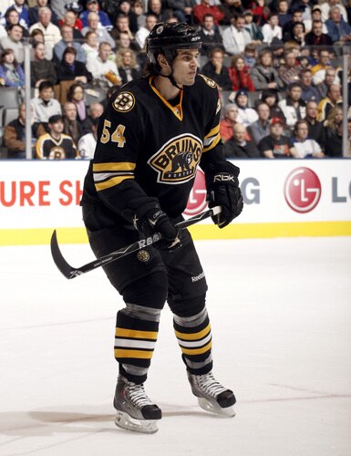 TORONTO - DECEMBER 19:  Adam McQuaid #54 of the Boston Bruins during his first NHL game action December 19, 2009 against the Toronto Maple Leafs at the Air Canada Centre in Toronto, Ontario, Canada. <br /><br /><span class="help">(Photo by Abelimages/Getty Images)</span>
