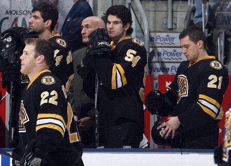 TORONTO - DECEMBER 19:  Adam McQuaid #54 of the Boston Bruins looks out from the bench before his first NHL game action December 19, 2009 against the Toronto Maple Leafs at the Air Canada Centre in Toronto, Ontario, Canada. <br /><br /><span class="help">(Photo by Abelimages/Getty Images)</span>