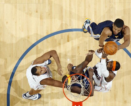 CHARLOTTE, NC - JANUARY 9:  Rudy Gay #22 and Zach Randolph #50 of the Memphis Grizzlies block against Gerald Wallace #3 of the Charlotte Bobcats on January 9, 2010 at the Time Warner Cable Arena in Charlotte, North Carolina.  <br /><br /><span class="help">(Photo by Kent Smith/NBAE via Getty Images)</span>
