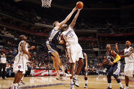 CHARLOTTE, NC - JANUARY 9:  Marc Gasol #33 of the Memphis Grizzlies blocks a shot by Nazr Mohammed #13 of the Charlotte Bobcats on January 9, 2010 at the Time Warner Cable Arena in Charlotte, North Carolina.  <br /><br /><span class="help">(Photo by Kent Smith/NBAE via Getty Images)</span>