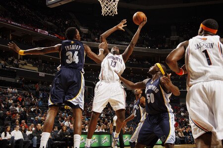 CHARLOTTE, NC - JANUARY 9:  Nazr Mohammed #13 of the Charlotte Bobcats goes for the layup against Hasheem Thabeet #34 of the Memphis Grizzlies on January 9, 2010 at the Time Warner Cable Arena in Charlotte, North Carolina.  <br /><br /><span class="help">(Photo by Kent Smith/NBAE via Getty Images)</span>