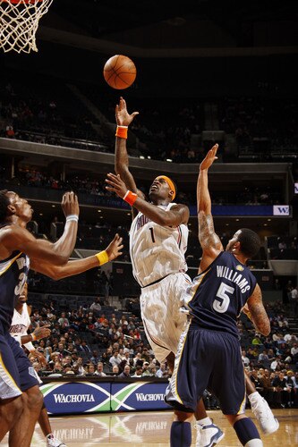 CHARLOTTE, NC - JANUARY 9:  Stephen Jackson #1 of the Charlotte Bobcats goes for the layup against Marcus Williams #5 of the Memphis Grizzlies on January 9, 2010 at the Time Warner Cable Arena in Charlotte, North Carolina.  <br /><br /><span class="help">(Photo by Kent Smith/NBAE via Getty Images)</span>