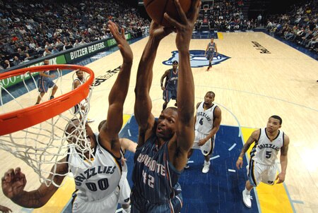 MEMPHIS, TN - FEBRUARY 26: Theo Ratliff #42 of the Charlotte Bobcats shoots over Darrell Arthur #00 of the Memphis Grizzlies on February 26, 2010 at FedExForum in Memphis, Tennessee.  <br /><br /><span class="help">(Photo by Joe Murphy/NBAE via Getty Images)</span>