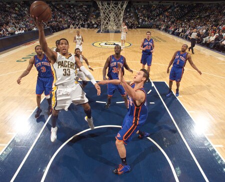INDIANAPOLIS - APRIL 7: Danny Granger #33 of the Indiana Pacers shoots over Danilo Gallinari #8 and Tracy McGrady #3 of the New York Knicks at Conseco Fieldhouse on April 7, 2010 in Indianapolis, Indiana.  <br /><br /><span class="help">(Photo by Ron Hoskins/NBAE via Getty Images)</span>