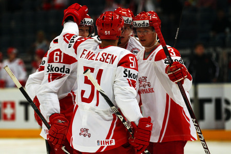 COLOGNE, GERMANY - MAY 17: Lars Eller of Denmark (#61) celebrates with team mates after scoring the first goal during the IIHF World Championship qualification round match between Belarus and Denmark at Lanxess Arena  on May 17, 2010 in Cologne, Germany.  <br /><br /><span class="help">(Photo by Lars Baron/Bongarts/Getty Images)</span>