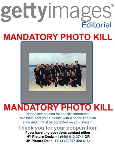 ATTENTION EDITORS!The following image was sent to you in error:GYI0060471256.jpgPlease delete this image from your system.BRIDGETOWN, BARBADOS - MAY 16:  The England team pose with the trophy on the beach after the final of the ICC World Twenty20 between Australia and England at the Kensington Oval on May 16, 2010 in Bridgetown, Barbados.  <br /><br /><span class="help">(Photo by Clive Rose/Getty Images)We apologize for the inconvenience.</span>