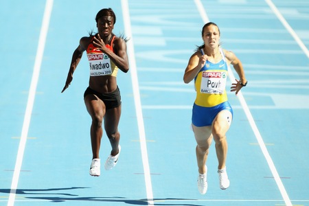 BARCELONA, SPAIN - JULY 28: Yasmin Kwadwo of Germany and Olesya Povh of Ukraine competes in the Womens 100m Heat during day two of the 20th European Athletics Championships at the Olympic Stadium on July 28, 2010 in Barcelona, Spain. <br /><br /><span class="help">(Photo by Ian Walton/Getty Images)</span>